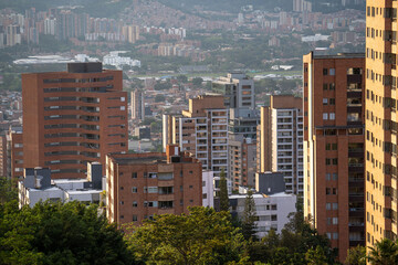 beautiful zoomed in capture of el poblado medellin in colombia during the sunset in the city