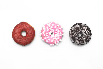 Delicious donuts on white background