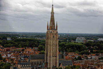 Fototapeta premium Bruges Belgium Medieval Town old city in Flanders Europe. Art and culture. Tourists from the world. Ancient medieval architecture gothic with towers buildings, canals, cobbled alleyways Brussels