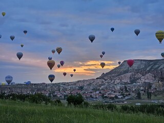 Hot air balloons on a background of mountains and blue sky Türkiye Cappadocia