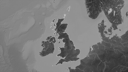 United Kingdom outlined. Grayscale elevation map