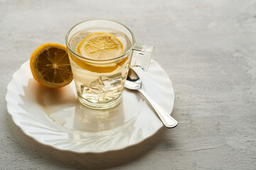 Cup of tea with ice and lemon