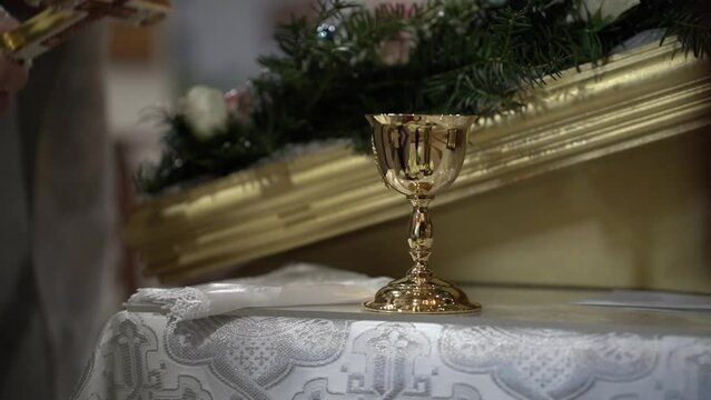 the golden cup stands in the church