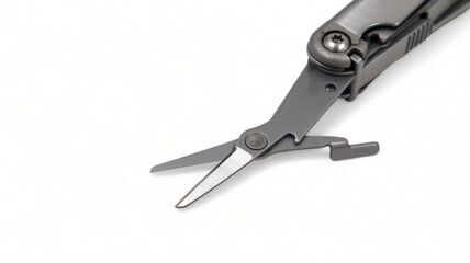 The scissors tool is pulled out of the multitool. Modern steel multitool with many tools isolated on white background. Compact and portable product. Pocket knife. EDC concept. Copy space.