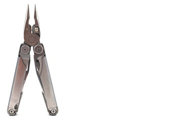 One modern gray iron open folding multifunctional knife isolated on a white background. Multitool with extended tools and pliers. Compact and portable product. Pocket knife. EDC concept.