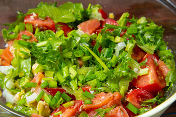 Vegetable salad avocado cherry tomato salted salmon boiled egg close-up