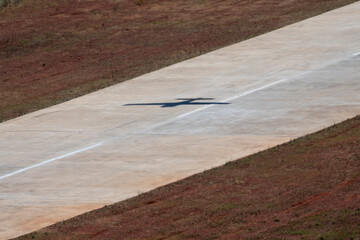 silhouette of an airplane on a runway