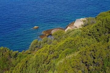 View of the sea and shoreline near Baja Sardinia on the (Emerald Coast), an exclusive coastal destination in Northern Sardinia on the Tyrrhenian Sea