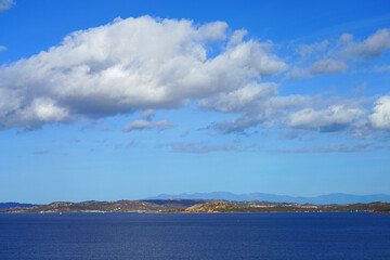 View of the sea and shoreline near Baja Sardinia on the (Emerald Coast), an exclusive coastal destination in Northern Sardinia on the Tyrrhenian Sea