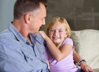 Father, girl and hug in portrait, support and happiness or love in childhood by single parent at home. Daughter, daddy and together in embrace, trust and bonding or security and connection on couch