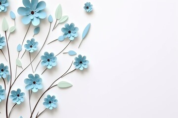 Romantic white background with space for text or image blue paper flowers on the right