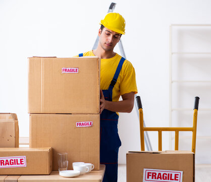 Young Male Professional Mover Doing Home Relocation