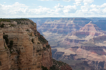 the Grand Canyon in Arizona, showcasing the iconic rock formations, vast canyon landscape, and the majestic views along the South Rim and North Rim.