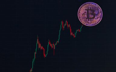 Physical image of gold bitcoin. Digital money trading concept.