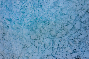 Aerial view about piled up ice floes on lake Balaton at Fonyódliget, Hungary. Abstract ice formation background.