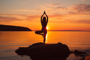  a woman doing yoga on a rock in the middle of a body of water with the sun setting in the background.