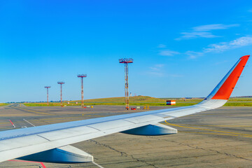 International Airport named after B.M. Kustodieva, Astrakhan - view of the runway with an airplane...