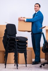 Young handsome businessman being fired from his work
