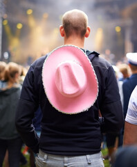 Man, crowd and music festival event audience or cowboy hat, rave outfit at party concert. Male...