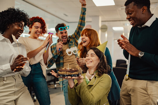 Woman who uses a wheelchair celebrating birthday and having a party at work