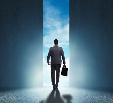 Businessman walking towards his ambition