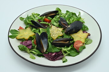 Seafood salad, mussels photo above on white background, photo for menu in restaurant 