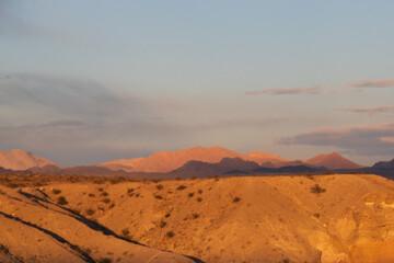Fototapeta na wymiar sunset over the mountains in the desert
