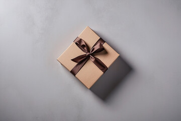 brown gift box on the grey paper background