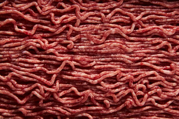 Close up of Raw and Fresh Minced Beef. Minimalistic food photo, low-key. Top view