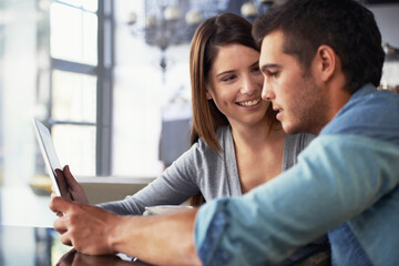 Tablet, smile and relax couple on coffee shop date, lunch break and check application, social media or online cafeteria menu. Relationship, customer and happy people in cafe, restaurant or diner - Powered by Adobe