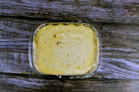 Tahini Tahina which is a Middle Eastern condiment made from toasted ground hulled sesame, served by itself (as a dip), with spices and herbs, Seafood Tahini used as a dip and an appetizer side plate