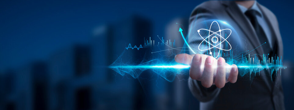 QUANTUM COMPUTING. Businessman Holding Quantum Icon and Global Network with Analyzing Technological Data, Quantum Processing, Network Connection on Interface Background, Quantum Algorithms. - Powered by Adobe