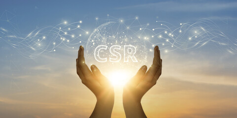 CSR. Man Holding Global Network and Connecting Data of Corporate Social Responsibility with...