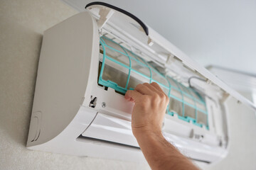 Dirty air conditioner filter need cleaning. Air conditioner service, repair and clean equipment.
