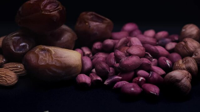 dates, peanuts, pistachios, hazelnuts, almonds, dried plums, cashews, seeds, pine nuts