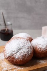 Delicious sweet buns on table against gray background, space for text