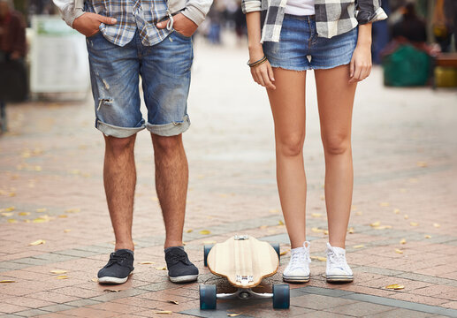 Skateboard, Legs And Urban Couple Of Friends Ready For Travel Ride, Outdoor Exercise Or Skills Training In City. Active, Cardio Fitness And Feet Of Skateboarder For Street Journey, Practice Or Skate