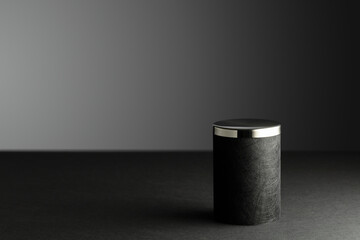 Black podium on a black background.