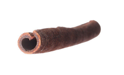 One aromatic cinnamon stick isolated on white