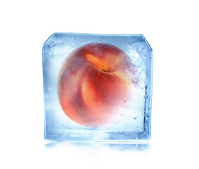 Frozen food. Raw peach in ice cube isolated on white