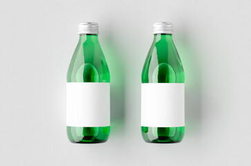 Water bottle mockup with a blank label. Green glass.