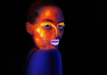 Portrait, art and creative with neon woman on black background for makeup, glitter or colorful...