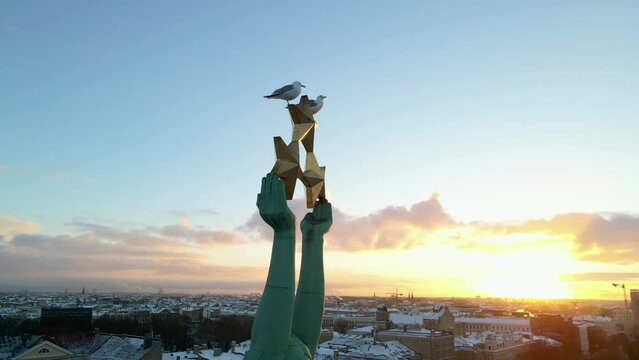Beautiful aerial view of Riga city - the capital of Latvia. Statue of liberty Milda. the symbol of freedom of Latvia.