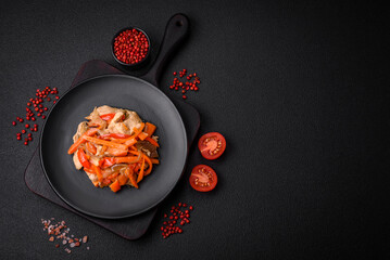 Delicious fresh stew with chicken or turkey with slices of sweet pepper and carrots