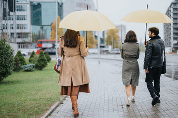 A diverse trio strolls on a wet sidewalk with yellow umbrellas in an urban setting, exemplifying...