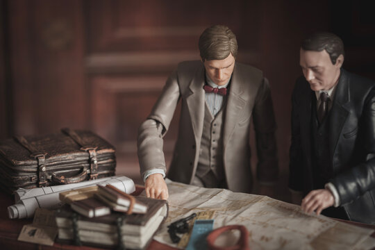 NEW YORK USA, JAN 29 2024: Indiana Jones and Marcus Brody studying a map in a library - Hasbro action figures