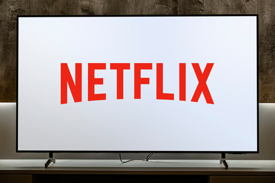Flat-screen TV set displaying logo of Netflix