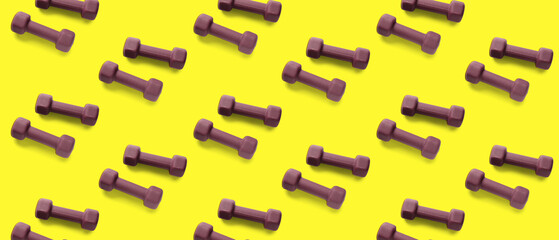 Purple dumbbells on white background