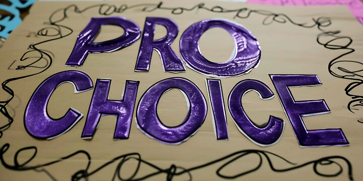 Poster with sign saying Pro Choice, feminism