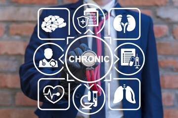 Doctor using virtual interface sees word: CHRONIC. Chronic disease management medical concept....